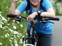 Exbourne youngster Joel Sawyer jumps on his bike for village defibrillator