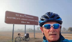 Sticklepath's 'banker on a bike' more than halfway around the world