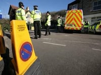 Part of JCB collides with multiple vehicles on A386 — man taken to hospital with serious injuries