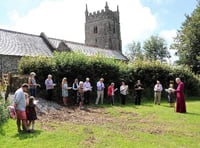 Bishop consecrates churchyard extension