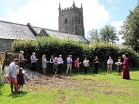 Bishop consecrates churchyard extension