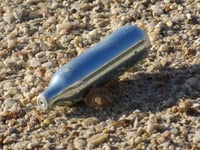 Laughing gas binge 'led drug taker to send death threats'