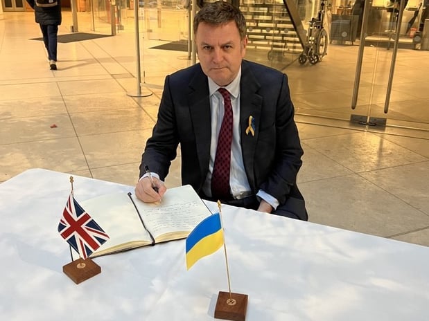 Central Devon MP Mel Stride signing the Parliamentary Book of Solidarity for Ukraine.