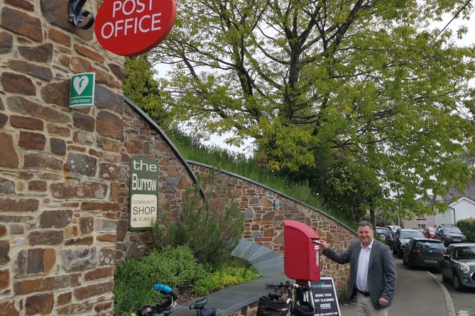 Mel Stride outside The Burrow in Exbourne, a lifeline community shop and post office.