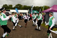 The Morris men are out and dancing all about 