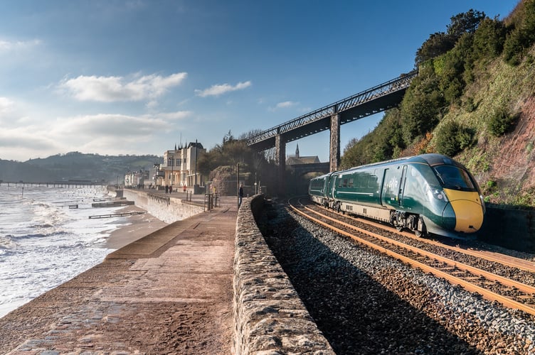 A Great Western Railway train makes its way along the Dawliosh seafront. Picture GWR