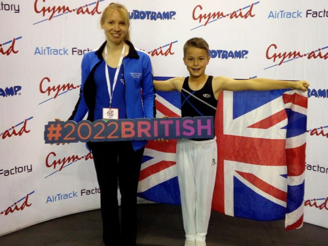 Okehampton Flyer Mason Parker-Groves with coach Vicki Pritchard.