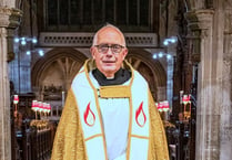 Okey rector given cathedral honour