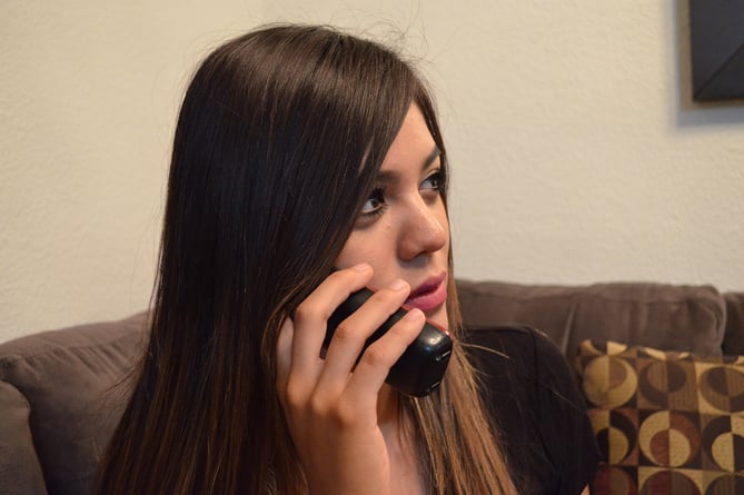 Telephone helpline: picture posed by model