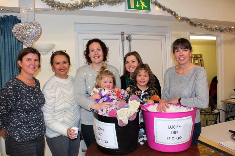 Members of the Spreyton Primary School PTA organising committee at the school's Christmas Fair, with headteacher Emma Donne, right