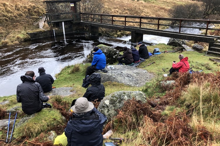 Okehampton ramblers have lunch at the weir at Vellake Corner