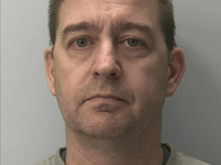 Jealous husband jailed for axe and knife threats
