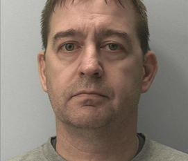 Jealous husband jailed for axe and knife threats