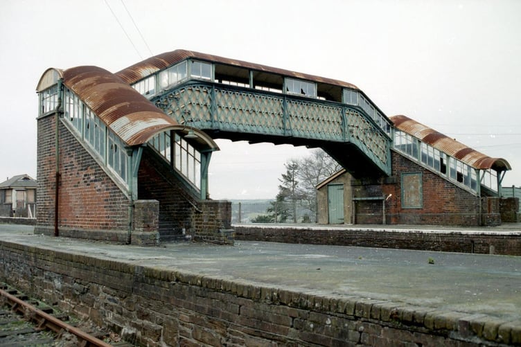 The rusting, vandalised remains of the historic footbridge at Okehampton station in 1982.