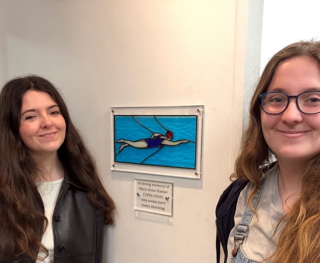 Stained glass plaque in memory of swimmer