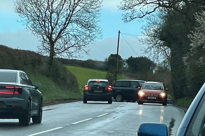 Vehicles turning around on the A377 near Spencecombe.  AQ 5908