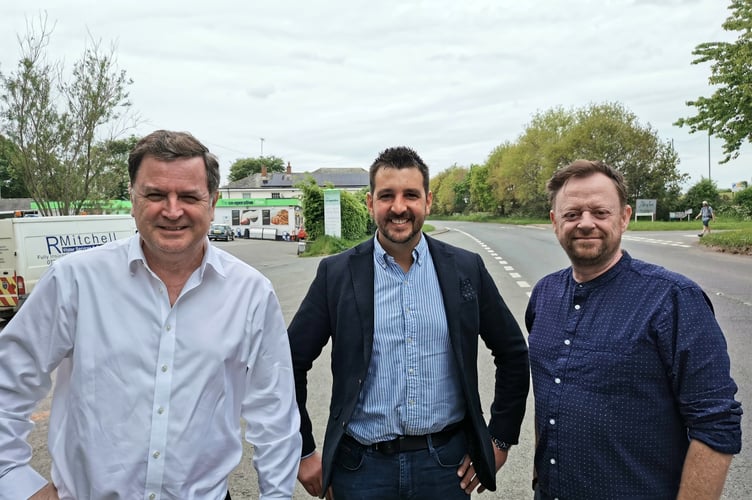 District Councillor Stuart Penny, right and Bow Parish Councillor Paul Edworthy, centre, securing support from local MP Mel Stride, left, for extra street lighting in Bow.