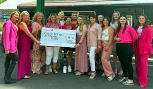 Quinn's hairdressers raise thousands for Cancer Research UK