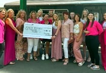 Quinn's hairdressers raise thousands for Cancer Research UK