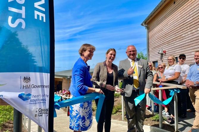 Selaine Saxby MP (left), Dehenna Davison MP (middle) and NDC Council Leader Ian Roome (right) cutting the ribbon at the Watersports Centre opening.