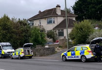 Police have found a person dead in a property at Kingskerswell – two arrested