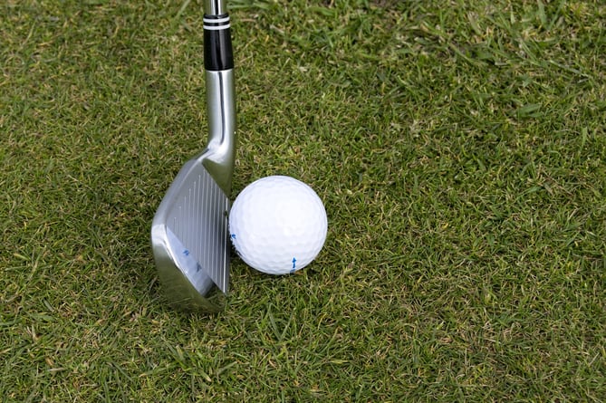  Golf ball and putter