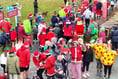 Okehampton braves the rain for PTFA Santa Run