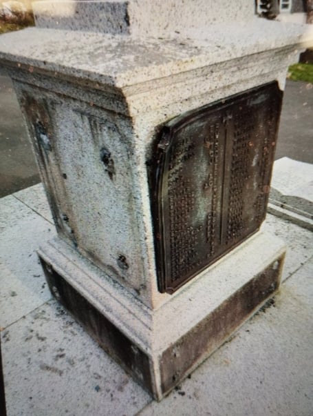 The war memorial at Ilfracombe with some plaques removed.