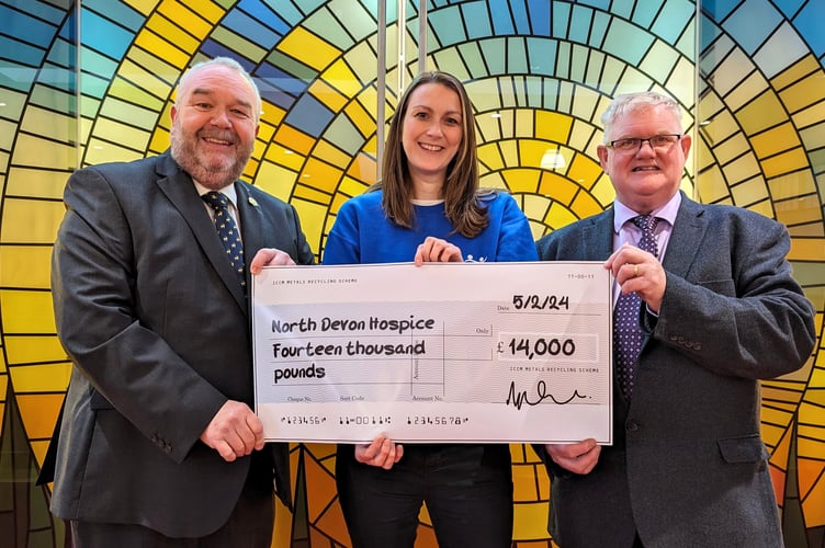 North Devon Crematorium manager Mark Drummond, left and (right) joint committee chairman Councillor Simon Inch presenting a cheque to North Devon Hospice Business Relationship Manager, Claire Paine.
