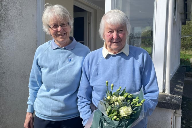 Doris Jewell is presented with flowers to mark her 93rd birthday