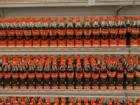 Coke's attached lids: Eco-alternative or annoying?