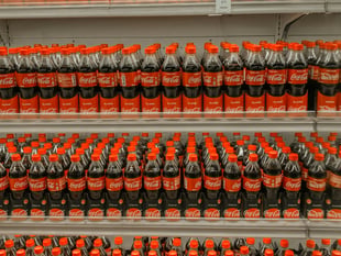 Coke's attached lids: Eco-alternative or annoying?