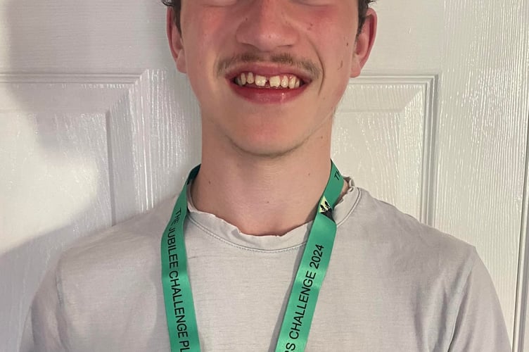 Damien, 15, from Tavistock is all smiles after completing the Jubilee Challenge at Ten Tors