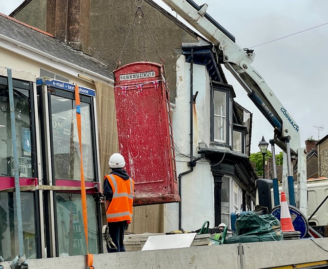 Red telephone box removed from town square