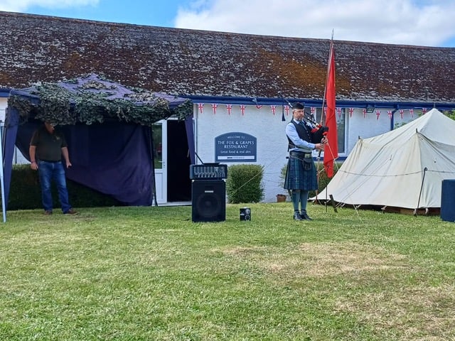 Lifton D-Day 80 celebrations included this Billy Millin bagpiper tribute - Billy (an unarmed musician) kept up morale during the fighting.