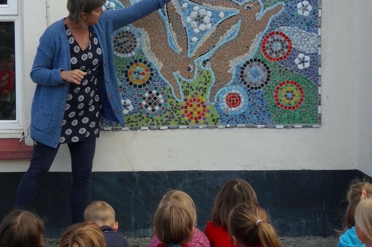 Spreyton School pupils have created a three hares mosaic to adorn their school