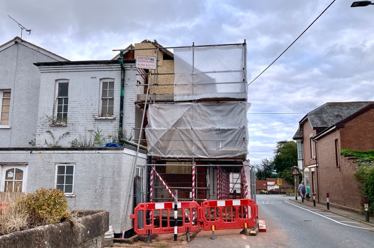 Scaffolding and wooden boards at Cross Hotel pub
