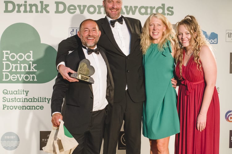 The Tors Inn landlord Dicky Harrison, second from left, and and Tors bar staff Lisa Jewell, second from right with Greg Parsons from Food Drink Devon, left, and sponsor Emily Almond from DCW Polymers