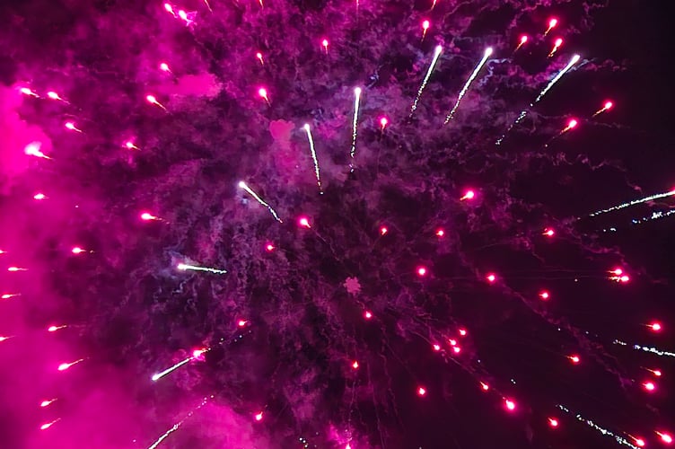 Bursts of purple lit up the sky