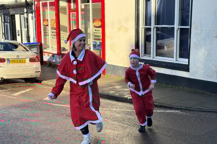 Taking part in the Santa Dash.  AQ 9095