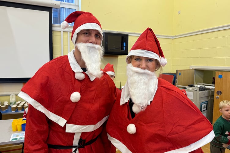 Two Santas ready to take part in the Dash.  AQ 9059
