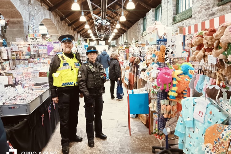 PCSO Kev Williams and Debbie Hollinson keeping i touch with the community in Tavistock Pannier Market