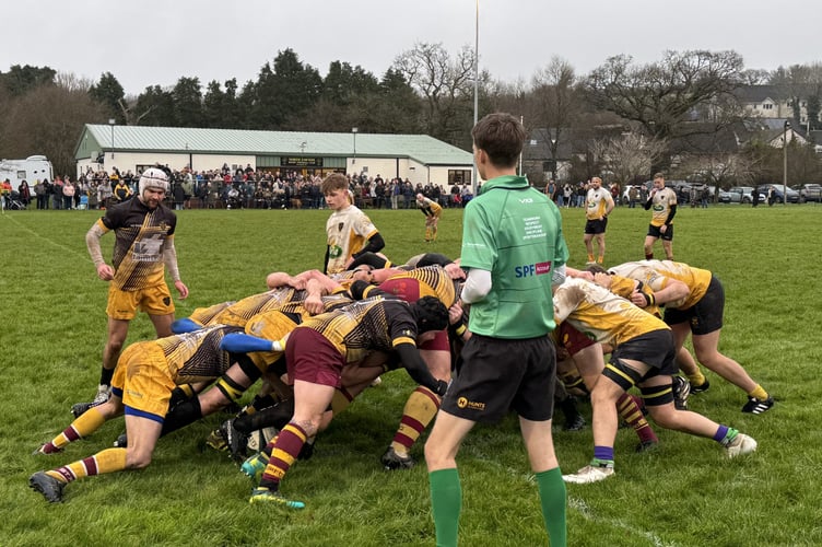 A scrum during the memorial game
