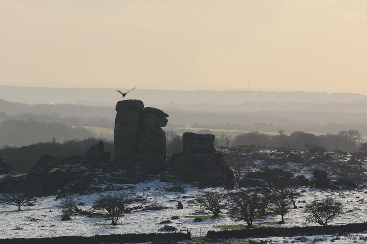 Rocky outcrops above the snow on Dartmoor. By Chris Cottrell.