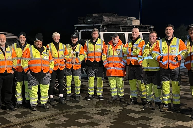 Heroes of the road - Matt Johnson (fourth from right) is one of the Devon & Cornwall 4x4 Response volunteer group which helped stranded snowbound drivers. He is pictured at the Plymouth WWII bomb evacuation a year ago. 