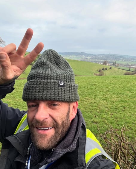 Perry Scopes has raised over £15,000 for charity through his ambitious shopping trolley hike.