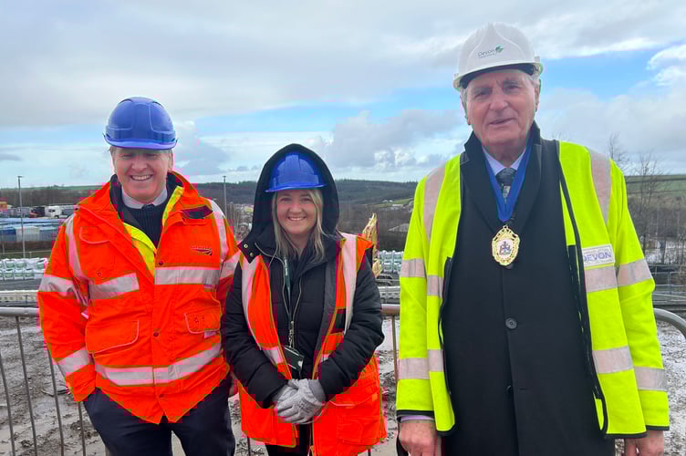 Cllr Neil Jory (West Devon Borough Council member for the economy), County councillor Lois Samuel (Okehampton Rural) and county council chairman John Hart at the turf cutting ceremony