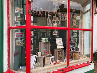 North Tawton WI display in post office window