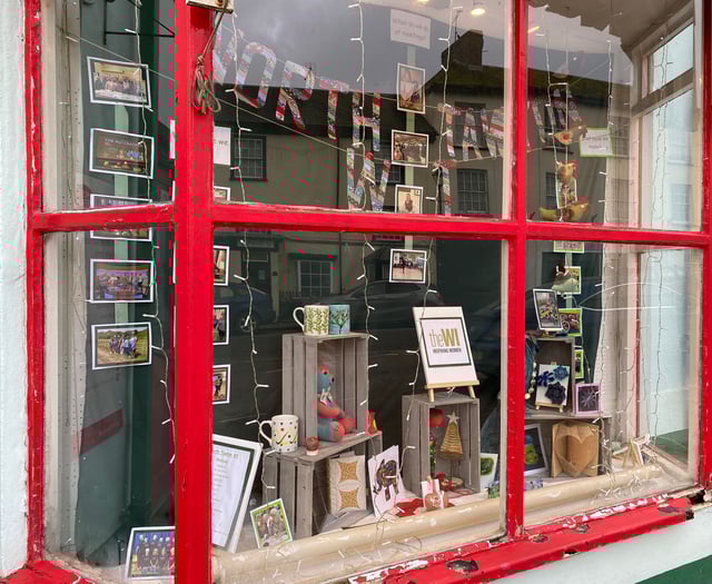 North Tawton WI display in post office window