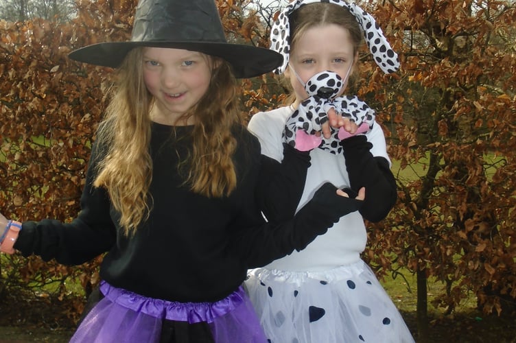 Whitchurch School World Book Day Dalmatian dog and witch at Whitchurch Primary's World Book Day
